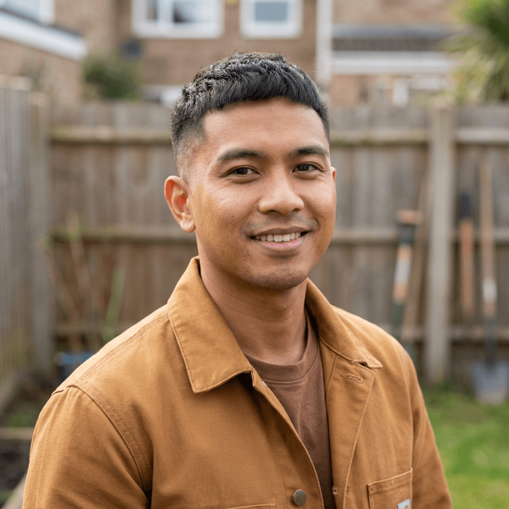 Chris B., a homeowner, standing proudly in his spotless kitchen
